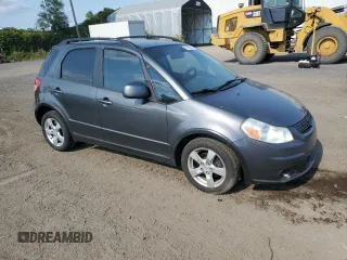 2010 Suzuki SX4 with VIN JS2YB5A24A6300249, listed as a Copart auction lot 71565394 with 291,886 mi miles and Salvage Title. Bid and sale history available at DreamBid. Image 4.