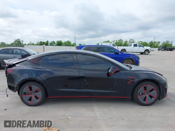 2023 Tesla Model 3 z VIN 5YJ3E1EA5PF484040, wystawiony jako IAAI lot #42128327 z przebiegiem 51 210 mil mil oraz . Historia ofert i sprzedaży dostępna na DreamBid. Obrazek 13.