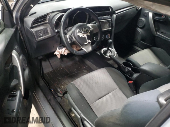 2014 Scion tC z VIN JTKJF5C71E3071683, wystawiony jako Copart lot #50971055 z przebiegiem Nie podano mil oraz Nie do naprawy • Non repairable. Historia ofert i sprzedaży dostępna na DreamBid. Obrazek 8.