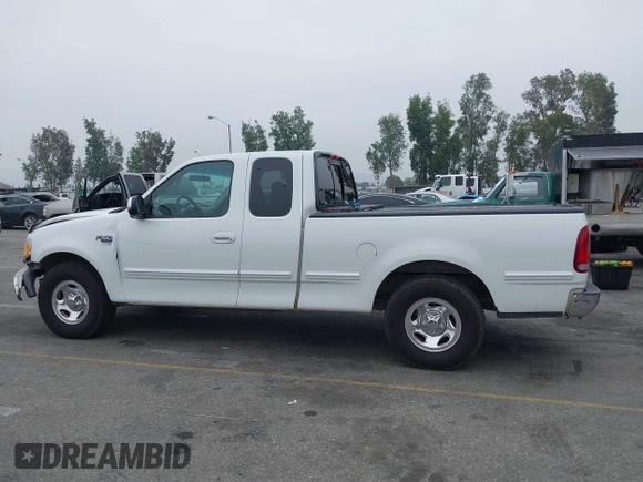 2000 Ford F-150 XL with VIN 1FTRX17L4YNA39407, listed as a IAAI auction lot 42141350 with 82,824 mi miles and . Bid and sale history available at DreamBid. Image 14.