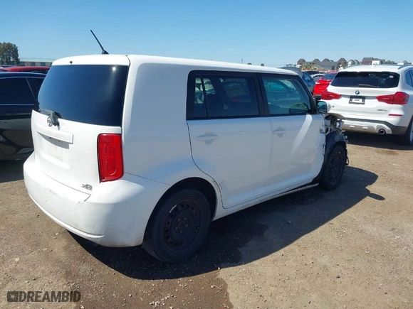 2009 Scion xB with VIN JTLKE50E391069053, listed as a IAAI auction lot 41834288 with 177111 miles. Bid and sale history available at carsss.com. Image 4.