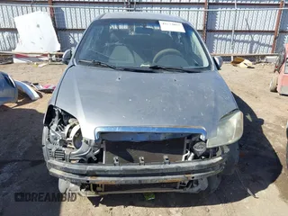2007 Chevrolet Aveo LS z VIN KL1TD566X7B087387, wystawiony jako IAAI lot #41673057 z przebiegiem 160 577 mil mil oraz . Historia ofert i sprzedaży dostępna na DreamBid. Obrazek 13.