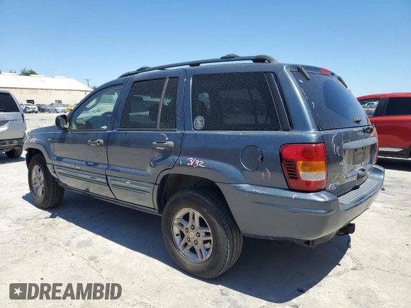 2004 Jeep Grand Cherokee Laredo z VIN 1J4GX48N54C371073, wystawiony jako Copart lot #52202855 z przebiegiem 212 368 mil mil oraz Szkoda całkowita • Salvage title. Historia ofert i sprzedaży dostępna na DreamBid. Obrazek 2.