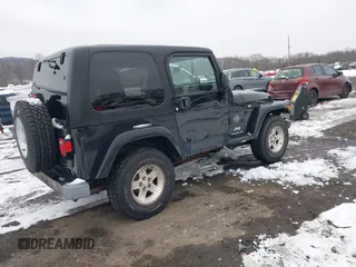 2005 Jeep Wrangler X with VIN 1J4FA39S55P353131, listed as a IAAI auction lot 41575949 with 154,026 mi miles and . Bid and sale history available at DreamBid. Image 4.