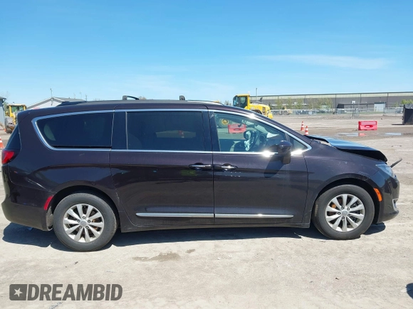 2017 Chrysler Pacifica Touring L with VIN 2C4RC1BG0HR747551, listed as a IAAI auction lot 42139664 with 120,057 mi miles and . Bid and sale history available at DreamBid. Image 12.