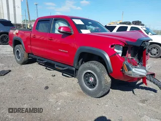 2016 Toyota Tacoma SR5 z VIN 5TFDZ5BNXGX004538, wystawiony jako IAAI lot #42299969 z przebiegiem Nie podano mil oraz . Historia ofert i sprzedaży dostępna na DreamBid. Obrazek 1.