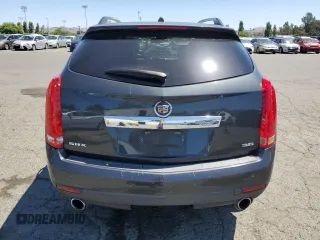 2014 Cadillac SRX Performance Collection z VIN 3GYFNCE36ES687267, wystawiony jako Copart lot #58242255 z przebiegiem 167 577 mil mil oraz Szkoda całkowita • Salvage title. Historia ofert i sprzedaży dostępna na DreamBid. Obrazek 6.