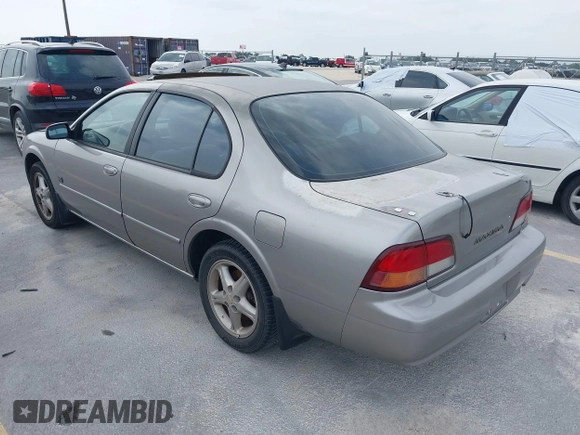 1999 Nissan Maxima GXE with VIN JN1CA21D6XT223369, listed as a IAAI auction lot 42141361 with 210,781 mi miles and . Bid and sale history available at DreamBid. Image 3.