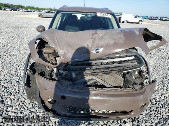 2011 MINI Countryman with VIN WMWZB3C53BWM00724, listed as a Copart auction lot 52293575 with Not Provided miles and Salvage Title. Bid and sale history available at DreamBid. Image 5.
