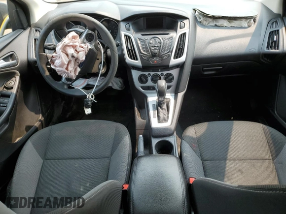 2014 Ford Focus SE z VIN 1FADP3K29EL187201, wystawiony jako Copart lot #59125805 z przebiegiem Nie podano mil oraz Szkoda całkowita • Salvage title. Historia ofert i sprzedaży dostępna na DreamBid. Obrazek 8.