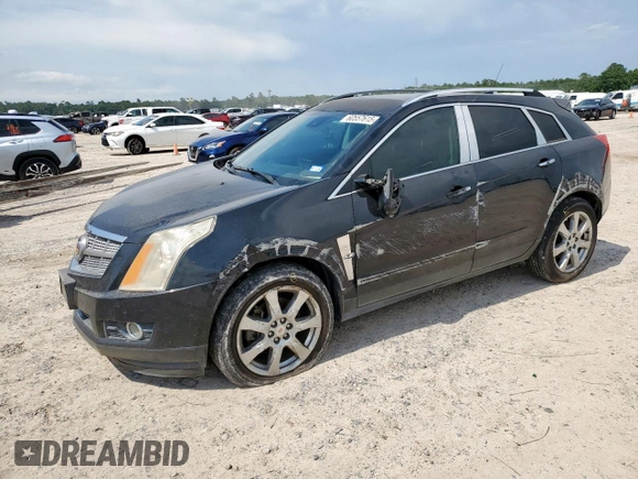 2012 Cadillac SRX Premium Collection z VIN 3GYFNCE39CS526425, wystawiony jako Copart lot #60557615 z przebiegiem 161 217 mil mil oraz Szkoda całkowita • Salvage title. Historia ofert i sprzedaży dostępna na DreamBid. Obrazek 1.