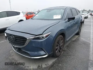 2023 Mazda CX-9 Carbon Edition with VIN JM3TCBDY5P0636916, listed as a IAAI auction lot 41804582 with 29,338 mi miles and . Bid and sale history available at carsss.com. Image 17.