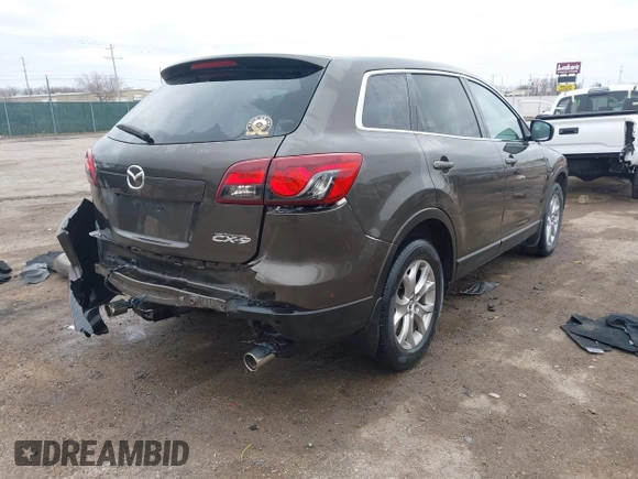 2015 Mazda CX-9 Touring with VIN JM3TB2CA5F0469348, listed as a IAAI auction lot 41516084 with 134,460 mi miles. Bid and sale history available at carsss.com. Image 4.