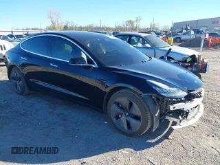 2020 Tesla Model 3 Standard Range Plus with VIN 5YJ3E1EA7LF802492, listed as a IAAI auction lot 40846048 with 36,488 mi miles. Bid and sale history available at carsss.com. Image 1.