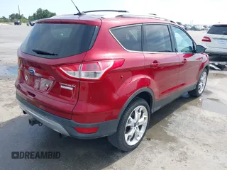 2013 Ford Escape Titanium with VIN 1FMCU0J98DUC93235, listed as a IAAI auction lot 42253289 with 107,030 mi miles and . Bid and sale history available at DreamBid. Image 4.