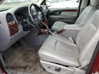 2007 GMC Envoy Denali with VIN 1GKET63M472231291, listed as a Copart auction lot 77020984 with 157,364 mi miles and Salvage Title. Bid and sale history available at DreamBid. Image 7.