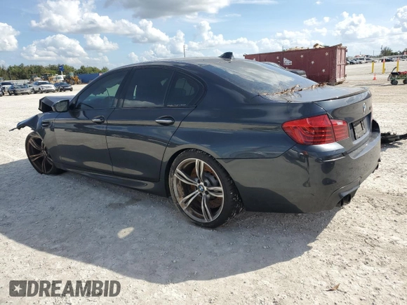 2014 BMW M5 with VIN WBSFV9C54ED097865, listed as a Copart auction lot 79897384 with 0 mi miles and Salvage Title. Bid and sale history available at carsss.com. Image 2.