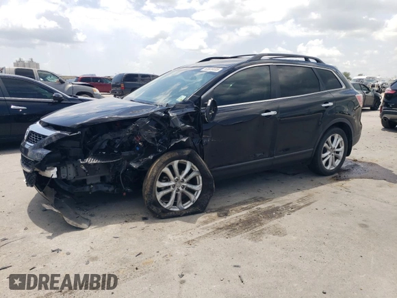 2012 Mazda CX-9 Grand Touring with VIN JM3TB2DA4C0361023, listed as a Copart auction lot 63839005 with 140,784 mi miles and Salvage title. Bid and sale history available at DreamBid. Image 1.