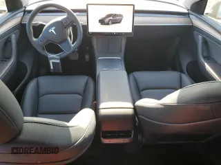 2024 Tesla Model Y with VIN 7SAYGDED4RF017614, listed as a Copart auction lot 88494625 with 11,209 mi miles and Salvage title. Bid and sale history available at DreamBid. Image 8.