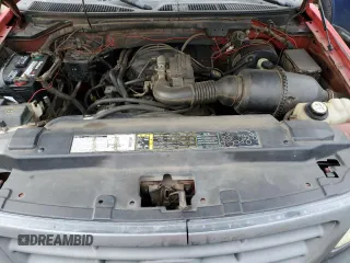 2001 Ford F-150 XL z VIN 3FTZF17291MA72686, wystawiony jako Copart lot #83103904 z przebiegiem 126 018 mil mil oraz Szkoda całkowita • Salvage title. Historia ofert i sprzedaży dostępna na DreamBid. Obrazek 11.