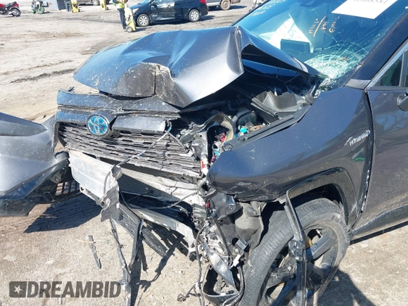2021 Toyota RAV4 Hybrid XSE with VIN 2T3E6RFV2MW017668, listed as a IAAI auction lot 42008581 with Not provided miles and . Bid and sale history available at DreamBid. Image 6.