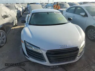 2015 Audi R8 5.2L z VIN WUAANAFG8F7001934, wystawiony jako Copart lot #76660884 z przebiegiem Nie podano mil oraz Szkoda całkowita • Salvage title. Historia ofert i sprzedaży dostępna na DreamBid. Obrazek 5.
