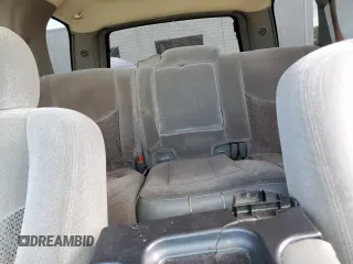 2004 Chevrolet Tahoe LT with VIN 1GNEC13Z14R191384, listed as a Copart auction lot 51371855 with 213,802 mi miles and Salvage title. Bid and sale history available at DreamBid. Image 10.