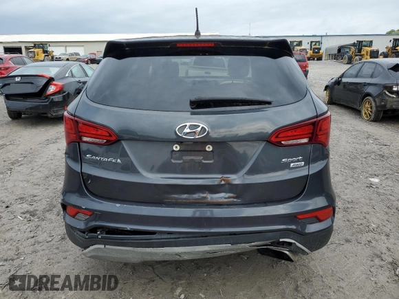 2018 Hyundai Santa Fe 2.4L z VIN 5XYZTDLB4JG553426, wystawiony jako Copart lot #54609875 z przebiegiem 93 328 mil mil oraz Szkoda całkowita • Salvage title. Historia ofert i sprzedaży dostępna na DreamBid. Obrazek 6.