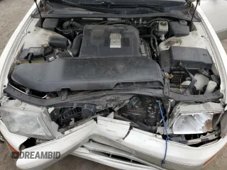 1996 Lexus LS 400 z VIN JT8BH22FXT0062989, wystawiony jako Copart lot #72543694 z przebiegiem 166 688 mil mil oraz Szkody całkowita. Historia ofert i sprzedaży dostępna na DreamBid. Obrazek 11.