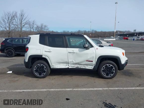 2015 Jeep Renegade Trailhawk with VIN ZACCJBCT6FPB32422, listed as a IAAI auction lot 41618410 with 42,219 mi miles and . Bid and sale history available at DreamBid. Image 13.
