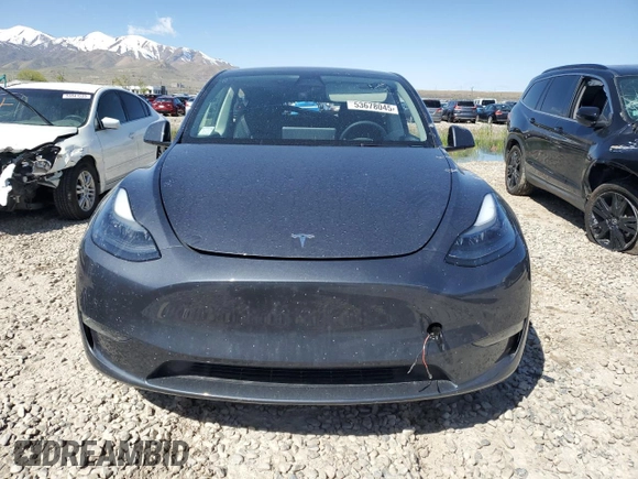 2022 Tesla Model Y Performance with VIN 7SAYGDEF1NF466938, listed as a Copart auction lot 53678045 with 50,135 mi miles and Salvage Title. Bid and sale history available at DreamBid. Image 5.