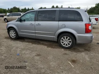 2014 Chrysler Town & Country Touring with VIN 2C4RC1BG1ER225720, listed as a Copart auction lot 58071165 with 104,502 mi miles and Salvage title. Bid and sale history available at DreamBid. Image 2.