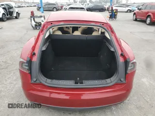 2013 Tesla Model S with VIN 5YJSA1AC2DFP10593, listed as a Copart auction lot 55055115 with Not Provided miles and Clean Title. Bid and sale history available at DreamBid. Image 6.