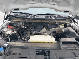 2023 Ford F-150 XL with VIN 1FTEW1C52PKF75099, listed as a IAAI auction lot 42104465 with 42,025 mi miles and . Bid and sale history available at DreamBid. Image 9.