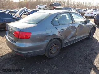 2013 Volkswagen Jetta Sedan S with VIN 3VW2K7AJ7DM370719, listed as a IAAI auction lot 41515497 with 139,060 mi miles. Bid and sale history available at carsss.com. Image 4.