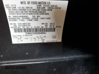 2014 Ford Flex SEL z VIN 2FMGK5C8XEBD40961, wystawiony jako Copart lot #58735935 z przebiegiem 294 919 mil mil oraz Szkoda całkowita • Salvage title. Historia ofert i sprzedaży dostępna na DreamBid. Obrazek 13.