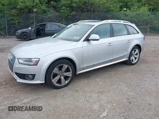 2013 Audi allroad Premium Plus with VIN WA1UFAFL0DA105820, listed as a IAAI auction lot 42095816 with 213,368 mi miles. Bid and sale history available at carsss.com. Image 2.