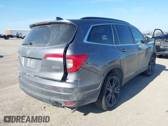 2021 Honda Pilot Special Edition with VIN 5FNYF5H27MB040801, listed as a IAAI auction lot 41656669 with 54,764 mi miles and . Bid and sale history available at DreamBid. Image 4.