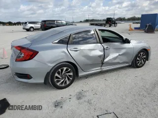 2016 Honda Civic EX with VIN 19XFC2F74GE059765, listed as a Copart auction lot 45555735 with 48,643 mi miles and Salvage Title. Bid and sale history available at DreamBid. Image 3.