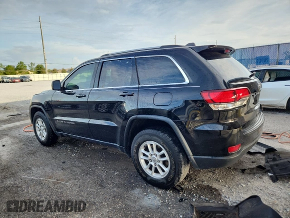2020 Jeep Grand Cherokee Laredo E with VIN 1C4RJEAG7LC113542, listed as a Copart auction lot 62715585 with 64,124 mi miles and Salvage title. Bid and sale history available at DreamBid. Image 2.