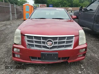 2009 Cadillac STS AWD z VIN 1G6DA67V190100207, wystawiony jako Copart lot #58911305 z przebiegiem Nie podano mil oraz Szkoda całkowita • Salvage title. Historia ofert i sprzedaży dostępna na DreamBid. Obrazek 5.