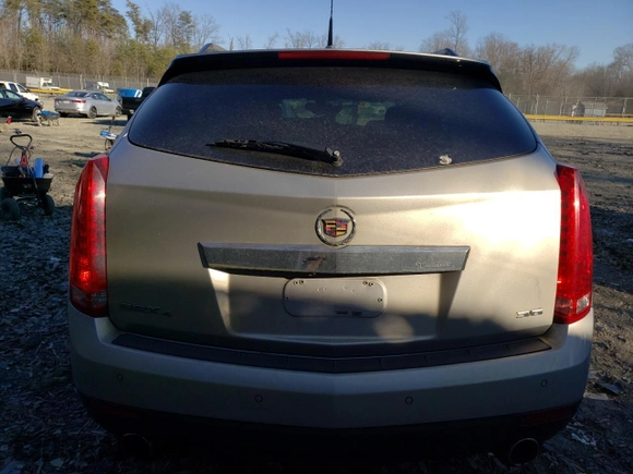 2014 Cadillac SRX Luxury Collection z VIN 3GYFNEE34ES641335, wystawiony jako Copart lot #47519325 z przebiegiem 124 407 mil mil oraz Szkoda całkowita • Salvage title. Historia ofert i sprzedaży dostępna na DreamBid. Obrazek 6.