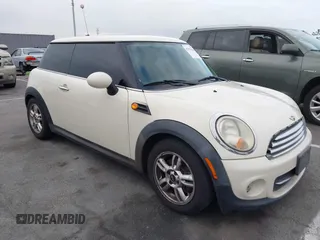 2011 MINI Hardtop with VIN WMWSU3C56BT093403, listed as a IAAI auction lot 42795188 with 123,454 mi miles and . Bid and sale history available at DreamBid. Image 1.