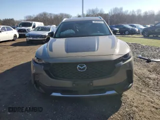 2023 Mazda CX-50 2.5 Turbo with VIN 7MMVABXY9PN145464, listed as a Copart auction lot 49785465 with 24,903 mi miles and Salvage Title. Bid and sale history available at carsss.com. Image 5.