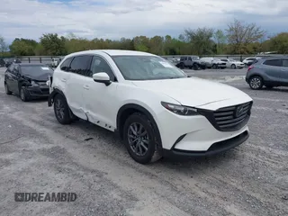 2022 Mazda CX-9 Touring z VIN JM3TCBCY4N0602402, wystawiony jako IAAI lot #41922351 z przebiegiem 27 287 mil mil oraz . Historia ofert i sprzedaży dostępna na DreamBid. Obrazek 1.