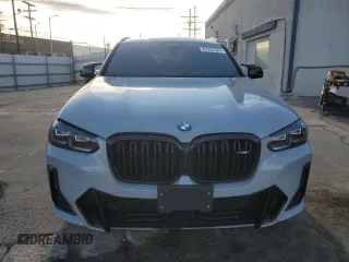 2024 BMW X4 M40i z VIN 5UX43DT03R9X53900, wystawiony jako Copart lot #87204324 z przebiegiem 8 410 mil mil oraz Szkoda całkowita • Salvage title. Historia ofert i sprzedaży dostępna na DreamBid. Obrazek 5.