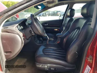 2000 Chrysler 300M M z VIN 2C3HE66G1YH430420, wystawiony jako Copart lot #57645995 z przebiegiem 66 111 mil mil oraz Szkoda całkowita • Salvage title. Historia ofert i sprzedaży dostępna na DreamBid. Obrazek 7.