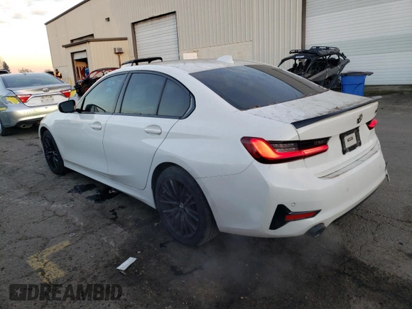 2022 BMW 3 Series 330i xDrive with VIN 3MW5R7J06N8C49660, listed as a Copart auction lot 83515904 with 33,966 mi miles and Salvage Title. Bid and sale history available at carsss.com. Image 2.