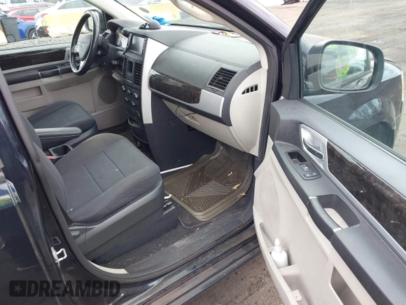 2010 Dodge Grand Caravan SXT with VIN 2D4RN5D13AR426980, listed as a IAAI auction lot 42035672 with 162,584 mi miles and . Bid and sale history available at DreamBid. Image 5.