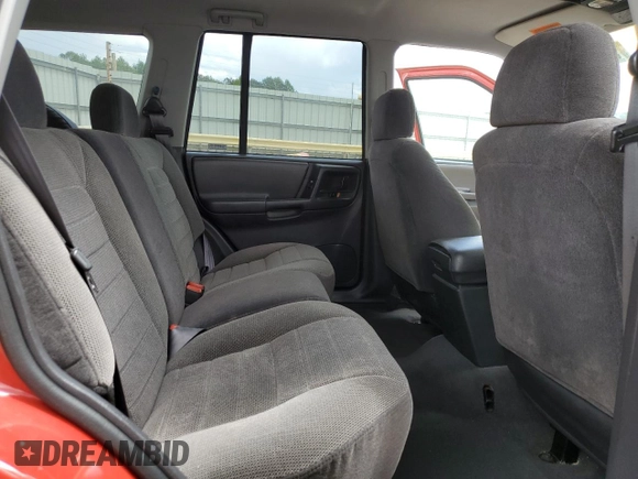 1997 Jeep Grand Cherokee Laredo with VIN 1J4GZ58S3VC739922, listed as a Copart auction lot 55667885 with 209,075 mi miles and Salvage title. Bid and sale history available at DreamBid. Image 11.